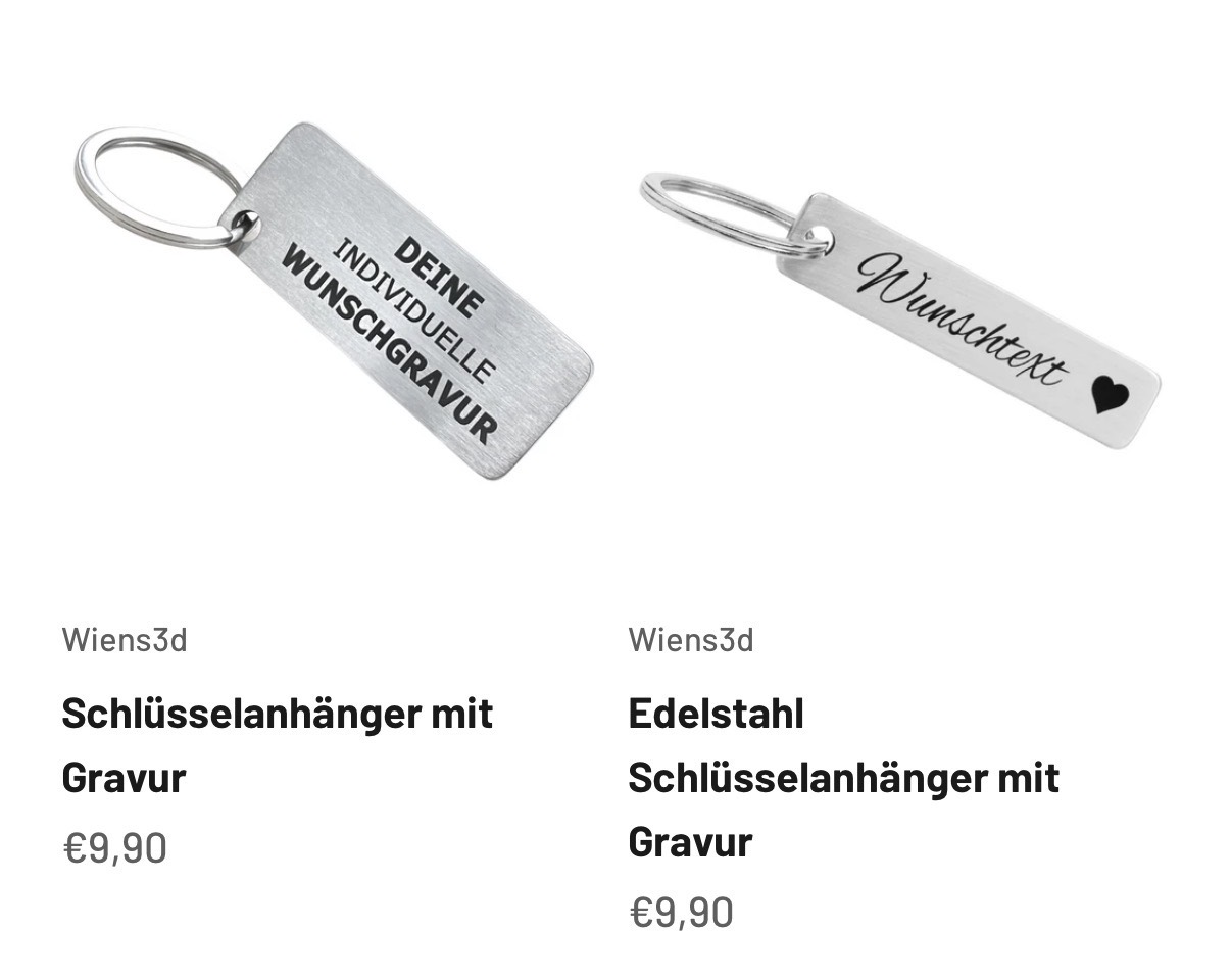 Die beiden Edelstahl-Schlüsselanhänger aus dem WIENS Shop